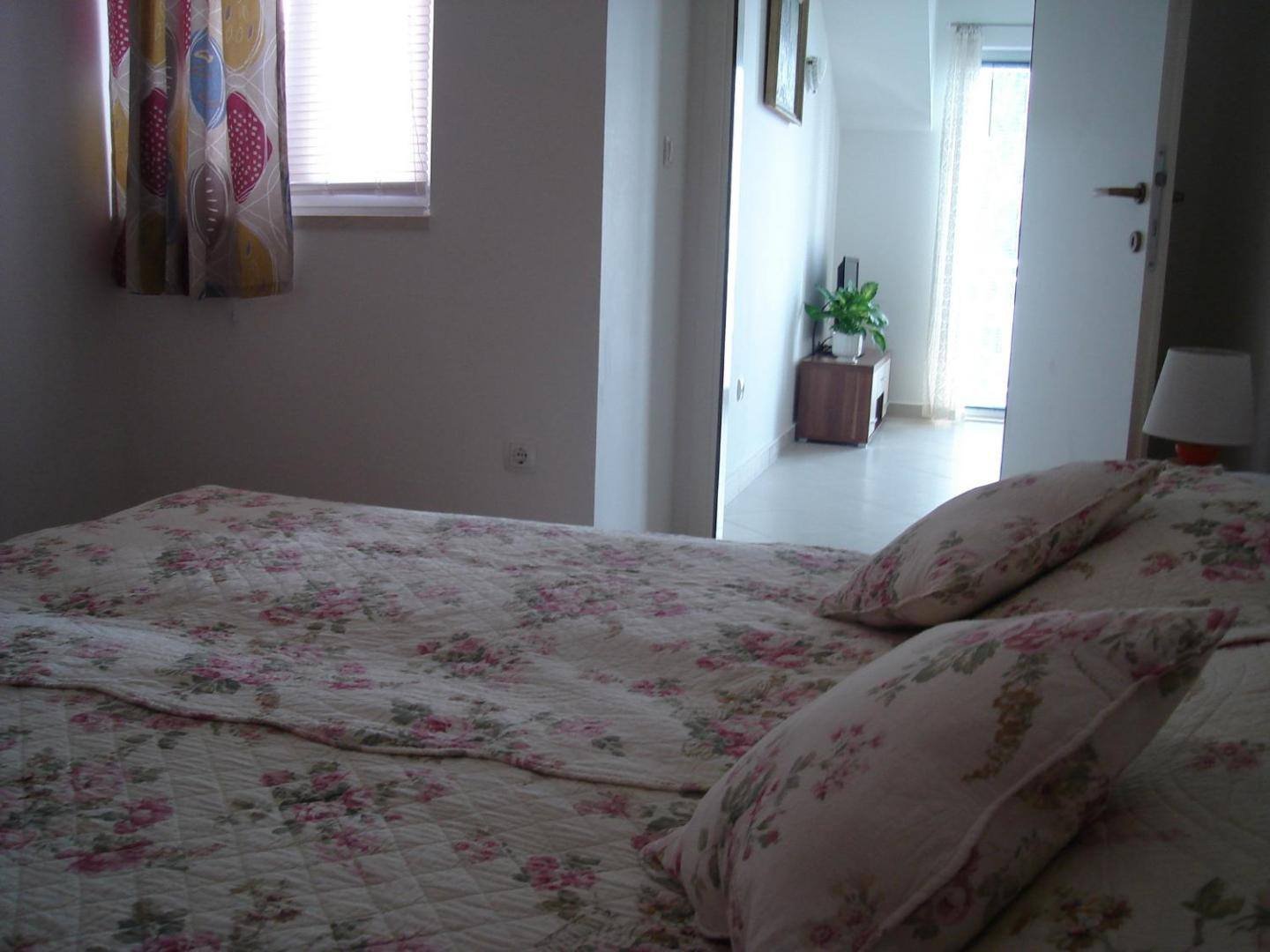 Bedroom with floral bedding